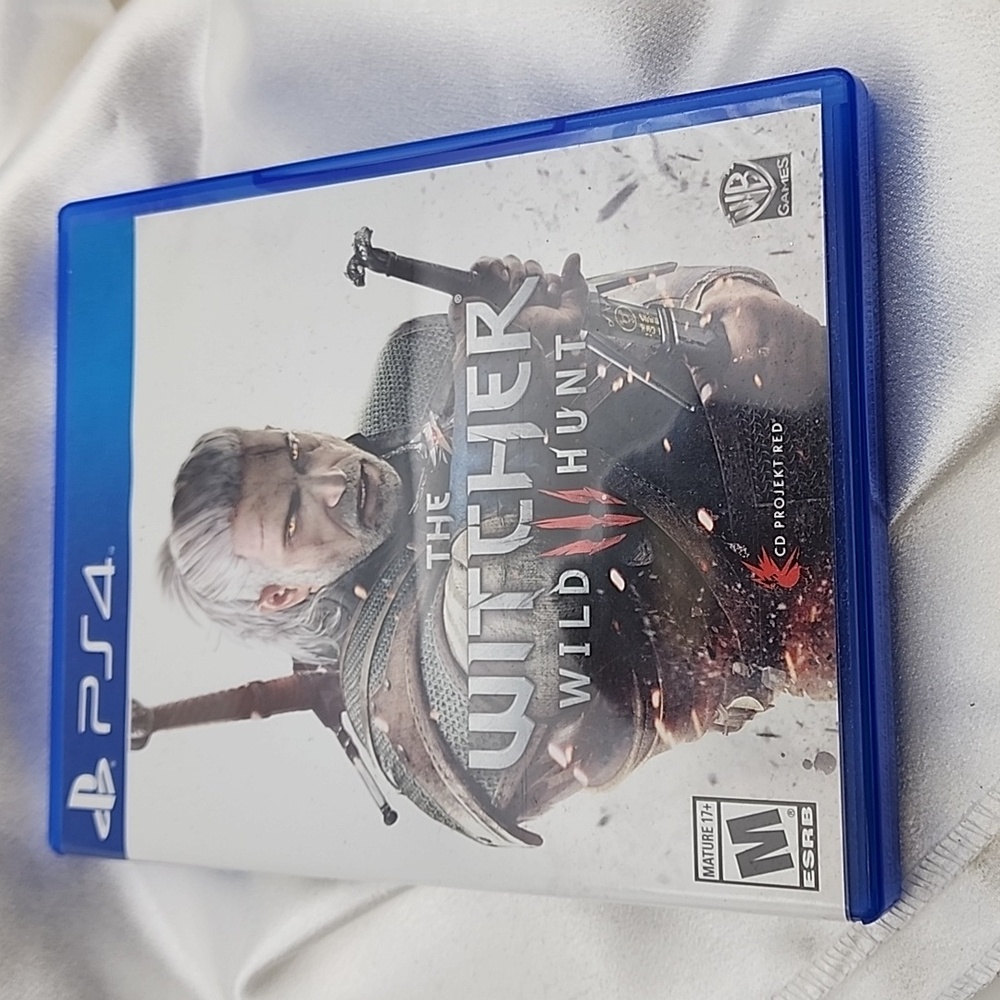 PRE-OWNED PS4 VIDEO GAME THE WITCHER WILD HUNT
